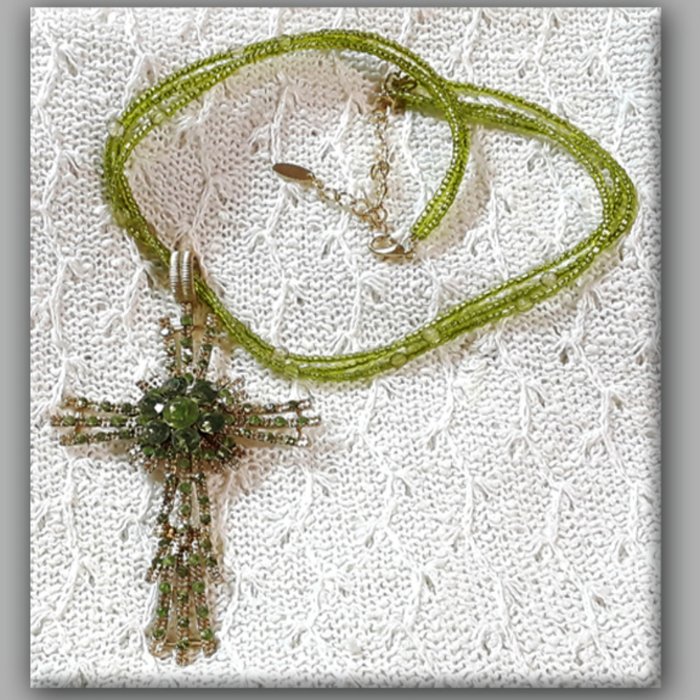 Apple green seed multi strand cross necklace